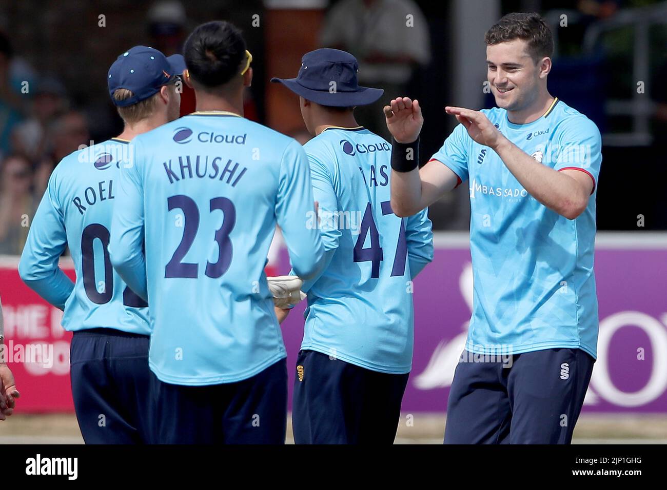 Raymond Toole of Essex celebrates with his team mates after taking the