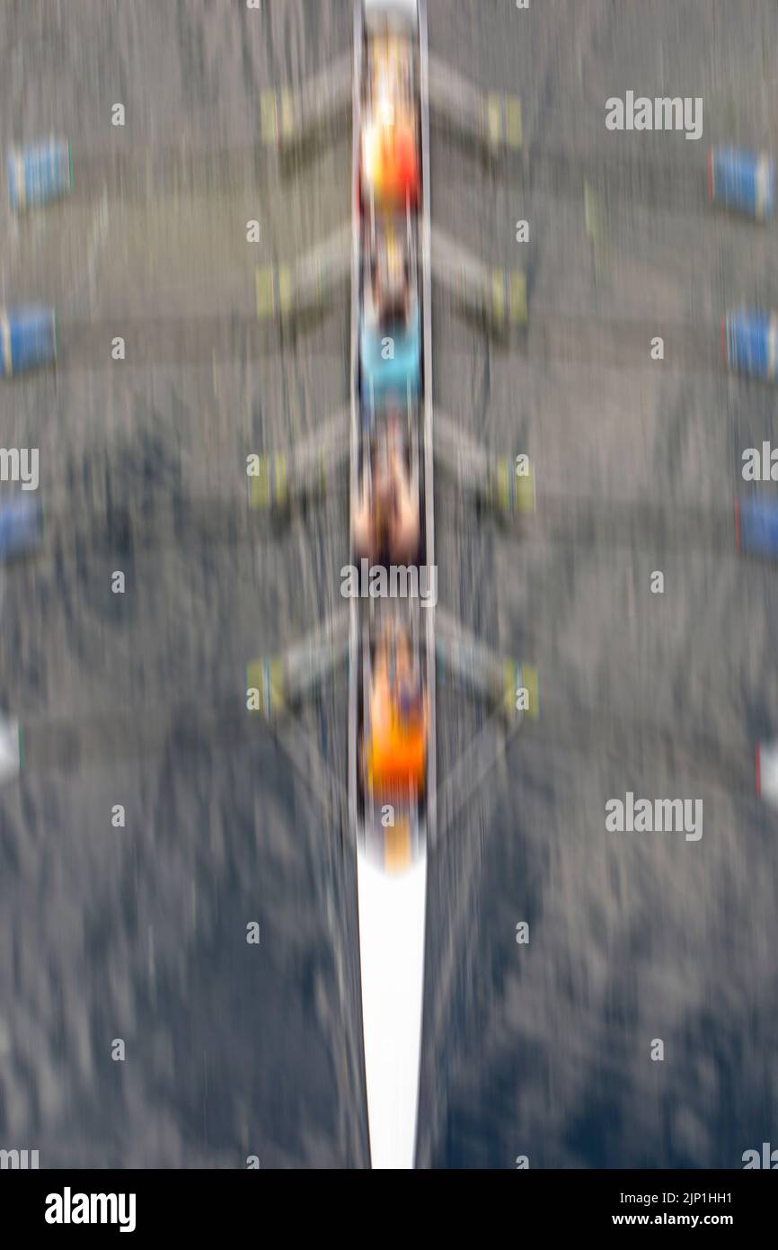 Long Exposure Photo Rowing Rowing at speed on a long exposure blurs rowers as they travel upsteam ...