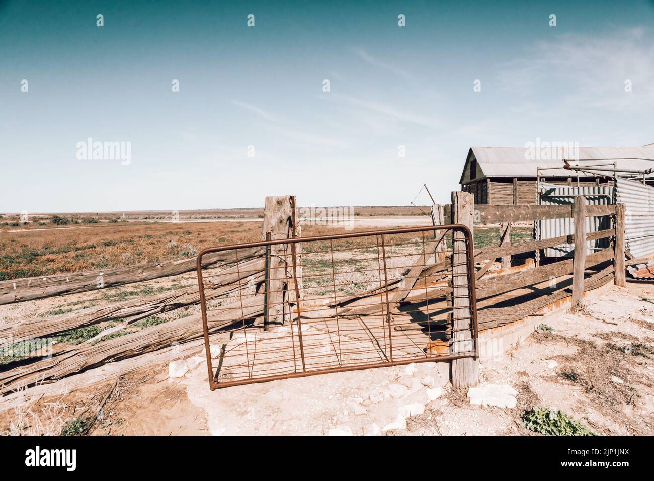 Farm buildings on the desert scrub plains Stock Photo