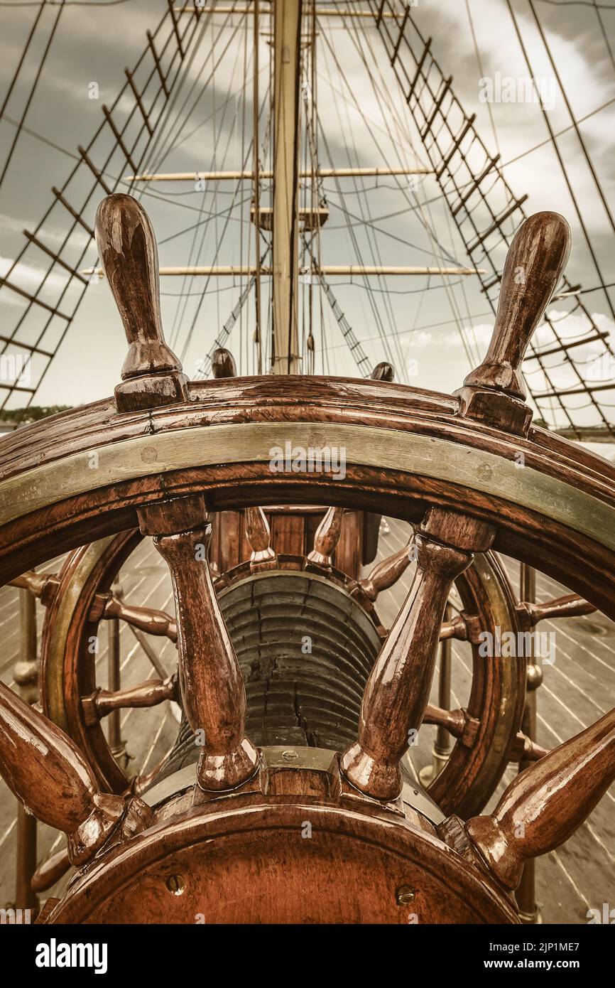 Retro styled image of the steering wheel of a sail boat Stock Photo