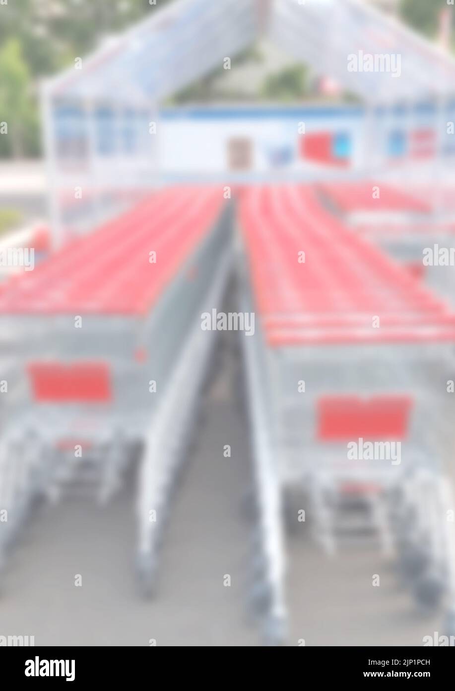 blurry background of row of shopping carts Stock Photo