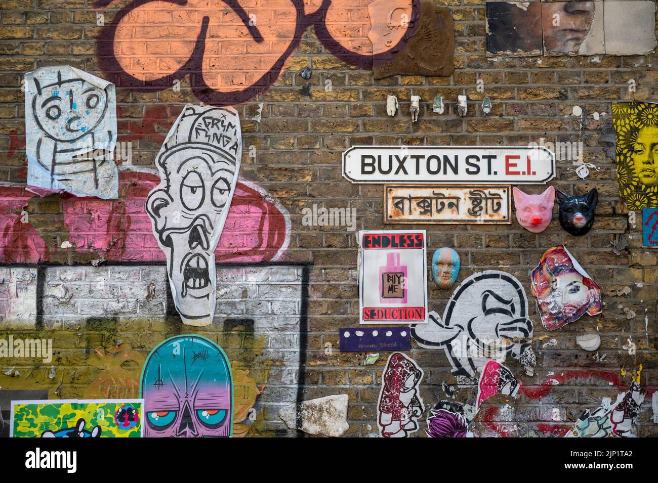 Grafitti on a wall in the Brick Lane area of London UK Stock Photo