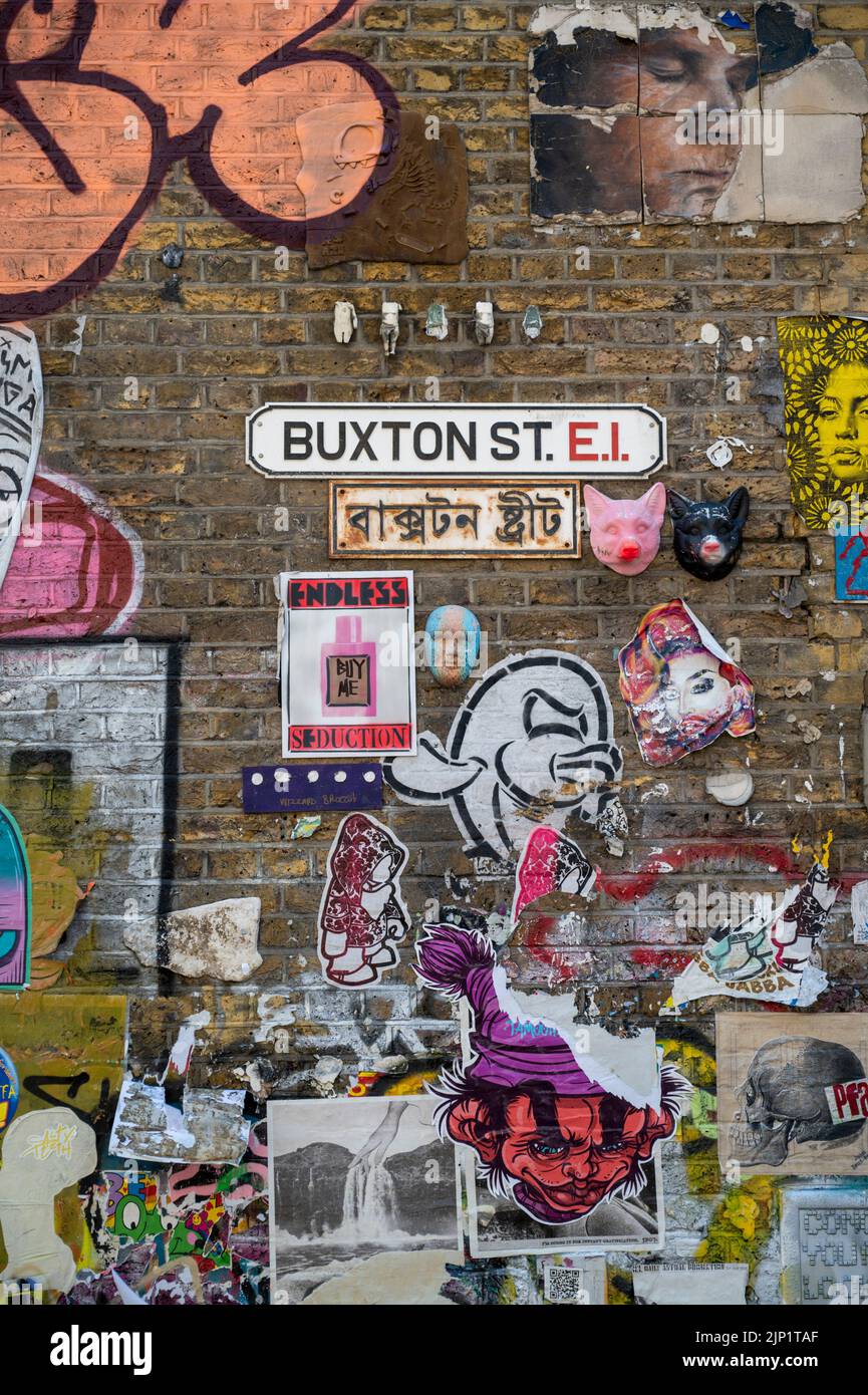 Grafitti on a wall in the Buxton street  area of London UK Stock Photo