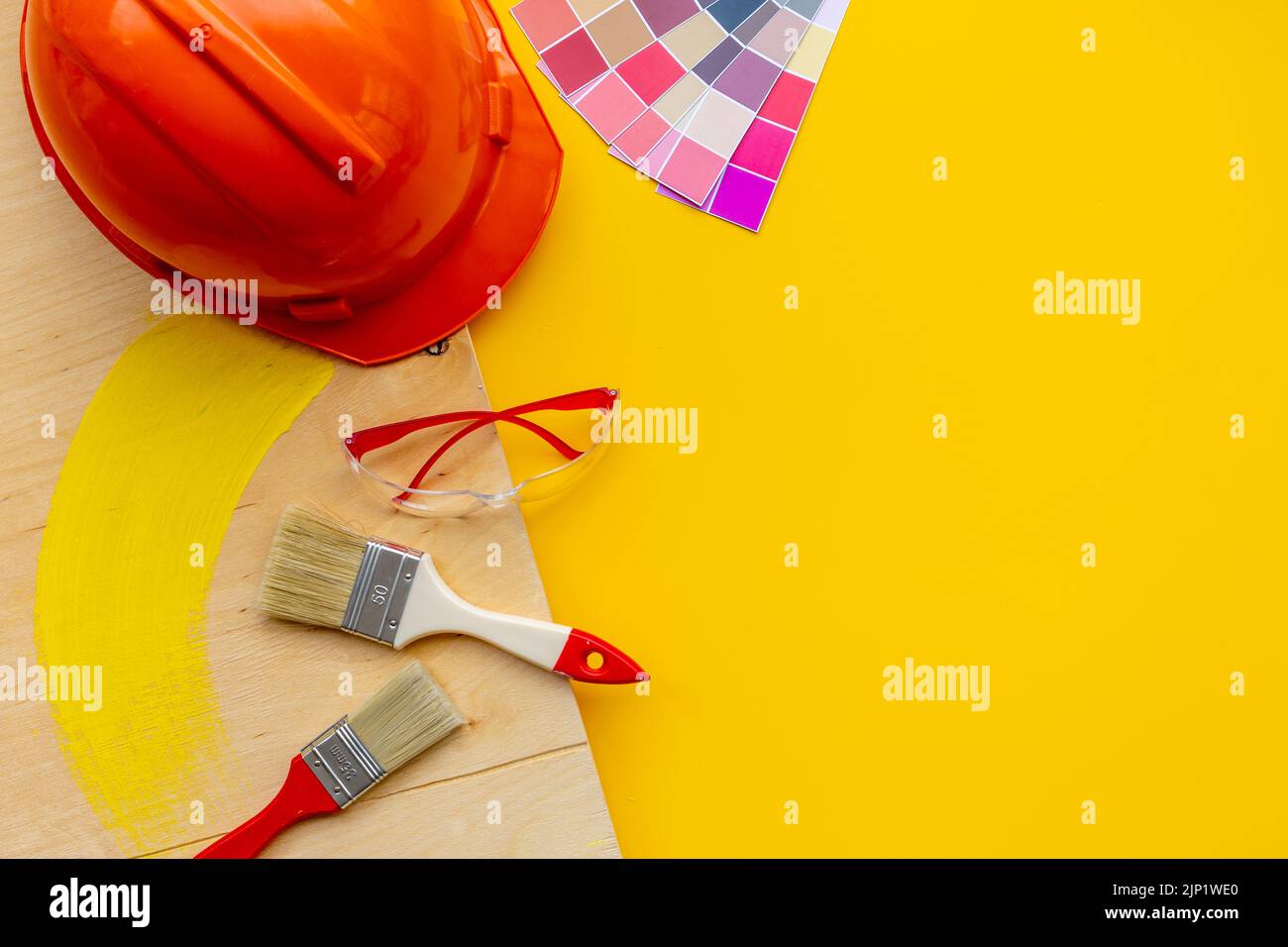 Equipment for house renovation and painting with construction helmet