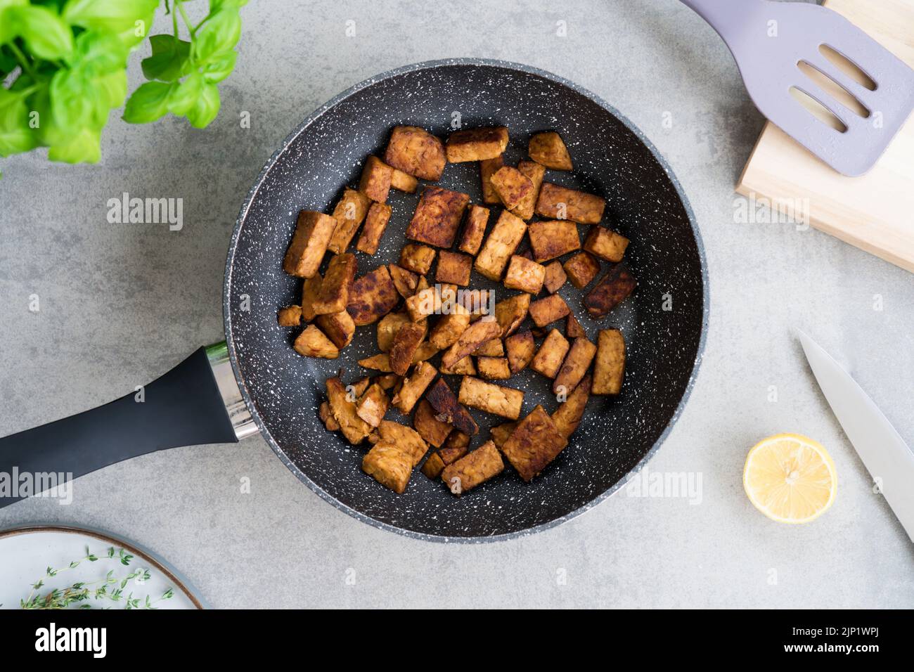 Top view roasted Tempeh or Tempeh, made of fermented soybean seeds