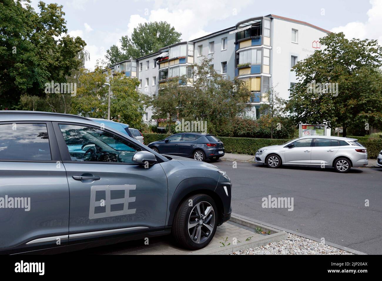 Berlin, Germany. 15th Aug, 2022. The doors of several cars have been taped over after swastikas were scratched into the doors and hoods of the cars. (to dpa "More swastikas discovered on car hoods in Berlin") Credit: Carsten Koall/dpa/Alamy Live News Stock Photo