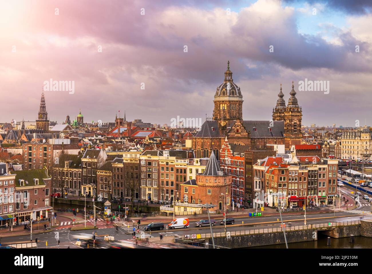 Amsterdam, Netherlands town cityscape over the Old Centre District with Basilica of Saint Nicholas. Stock Photo