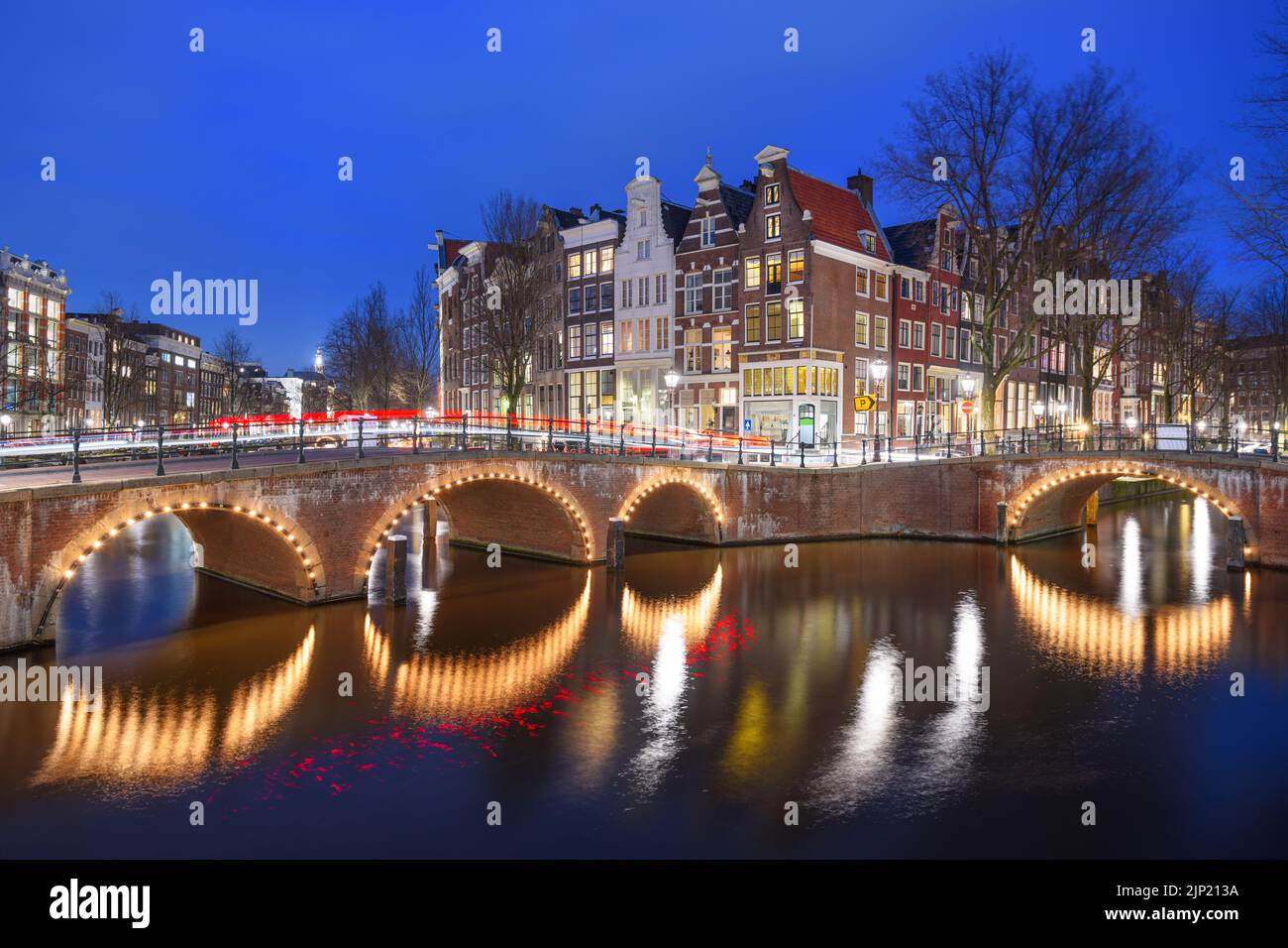 Amsterdam, Netherlands from the famous bridges and canals at twilight. Stock Photo