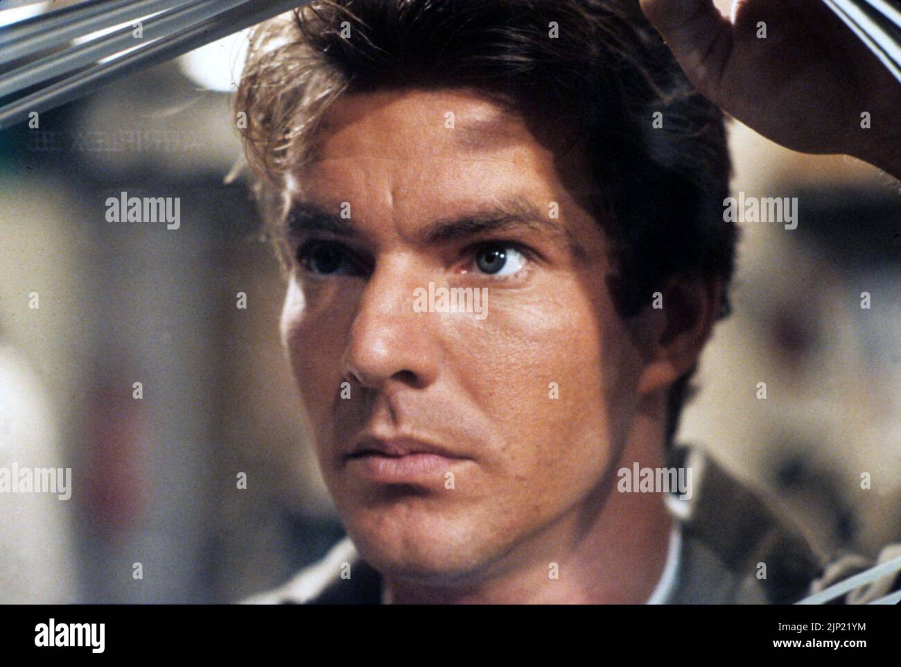DENNIS QUAID in INNERSPACE (1987), directed by JOE DANTE. Credit
