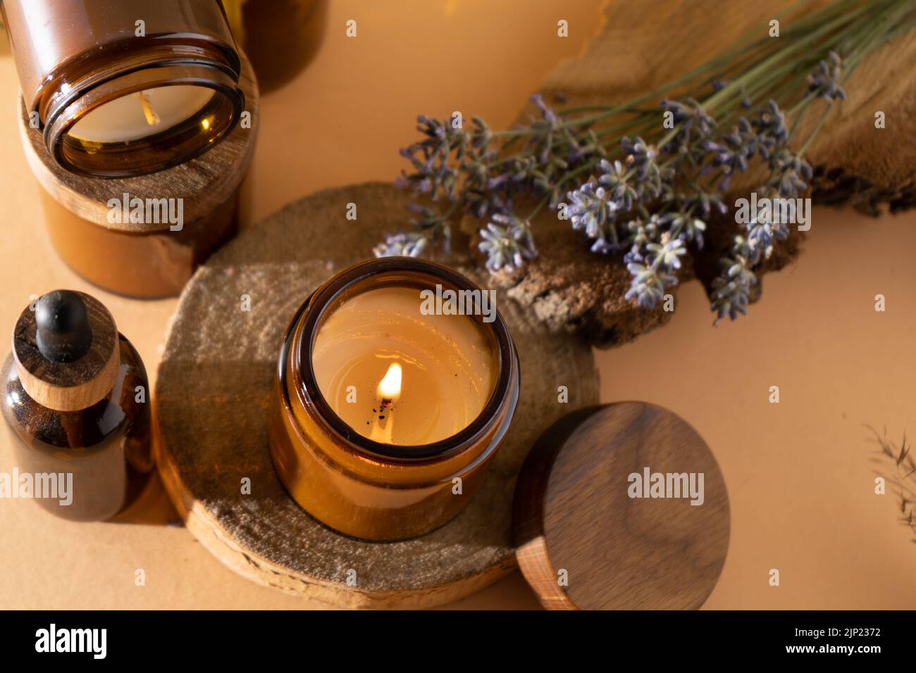 Soy candles in a glass jar. Aromatherapy. Burning candle and lavender ...