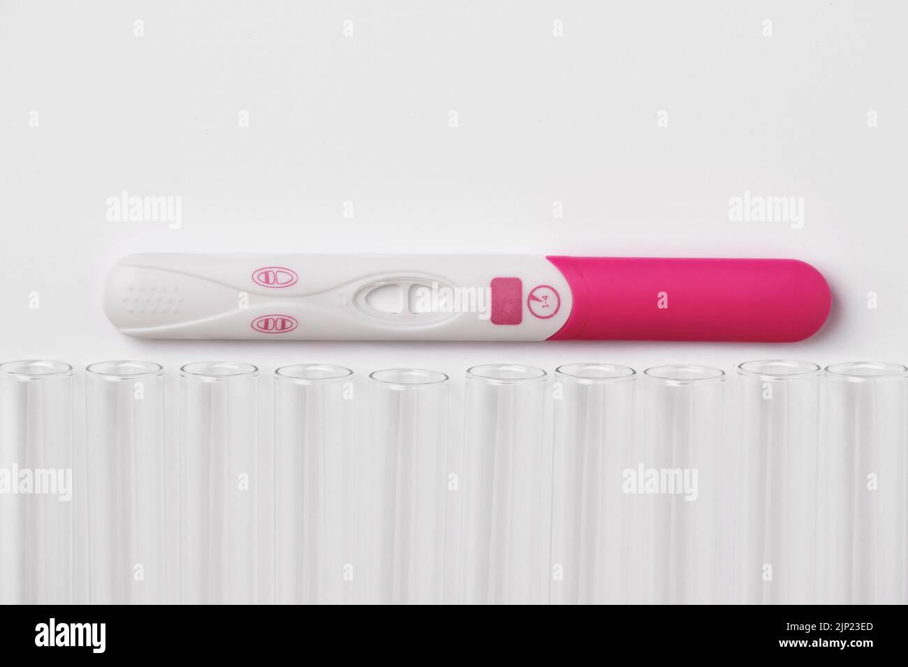 Positive Pregnancy Test With Laboratory Test Tube In Vitro 
