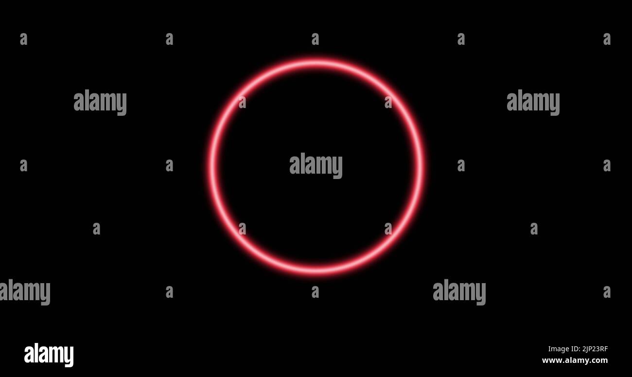 Image of glowing pink circle over black background Stock Photo - Alamy