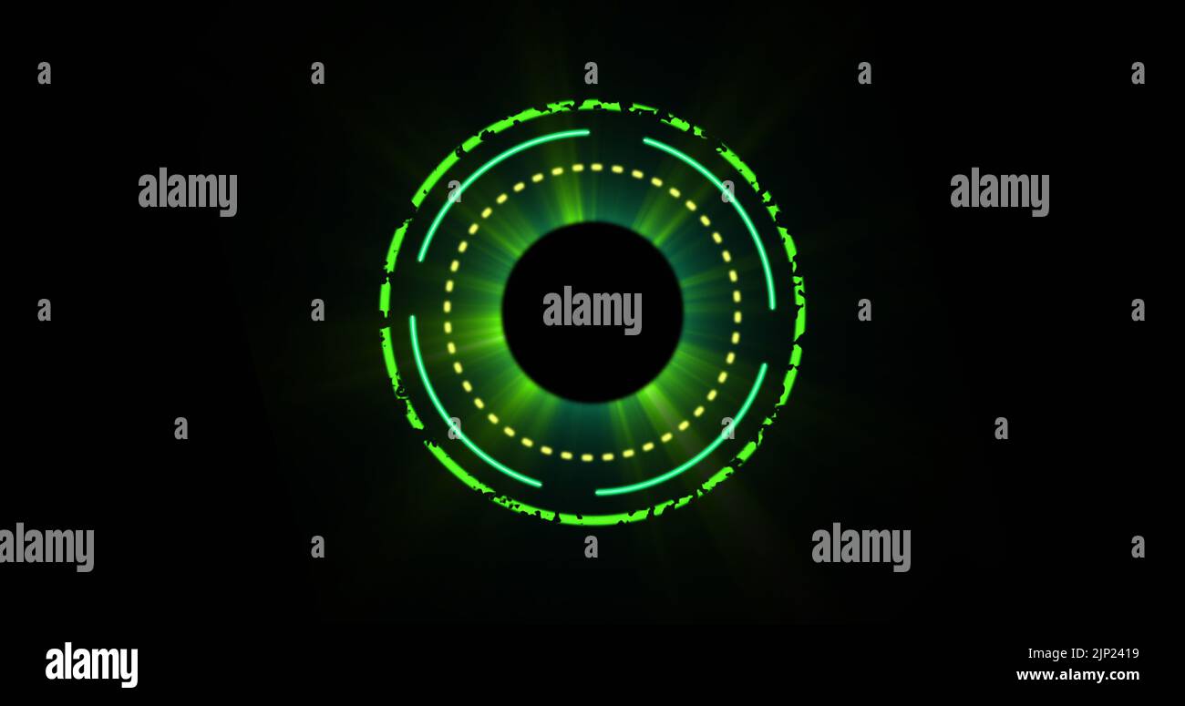 Image of glowing green circles over black background Stock Photo - Alamy