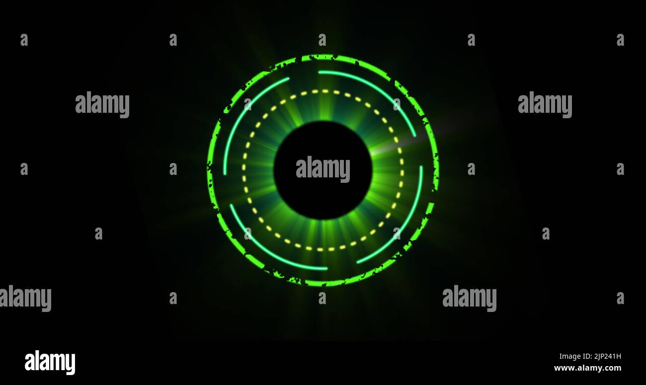 Image of glowing green circles over black background Stock Photo - Alamy