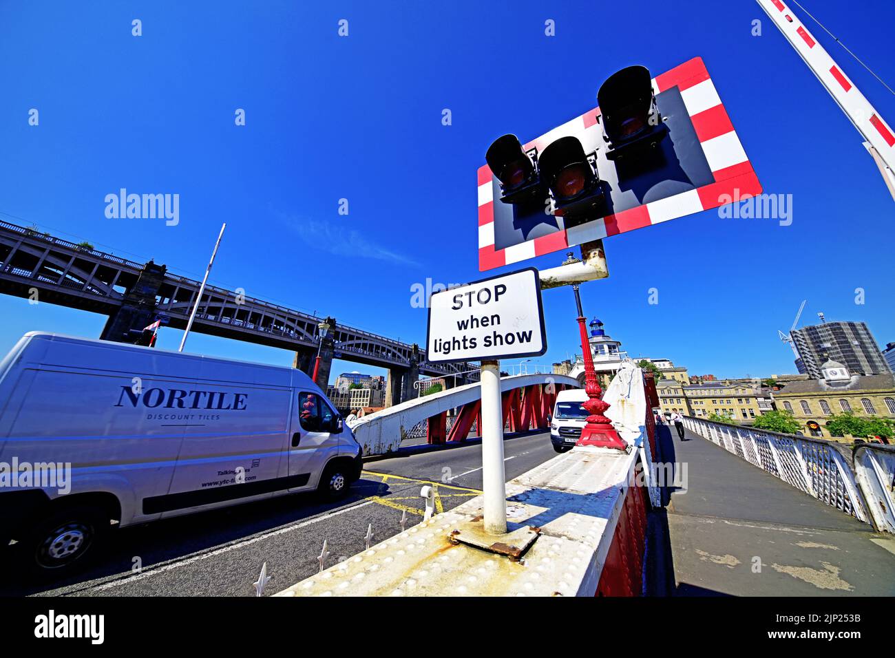 Newcastle Gateshead busy Swing Bridge crossing the river Tyne against a
