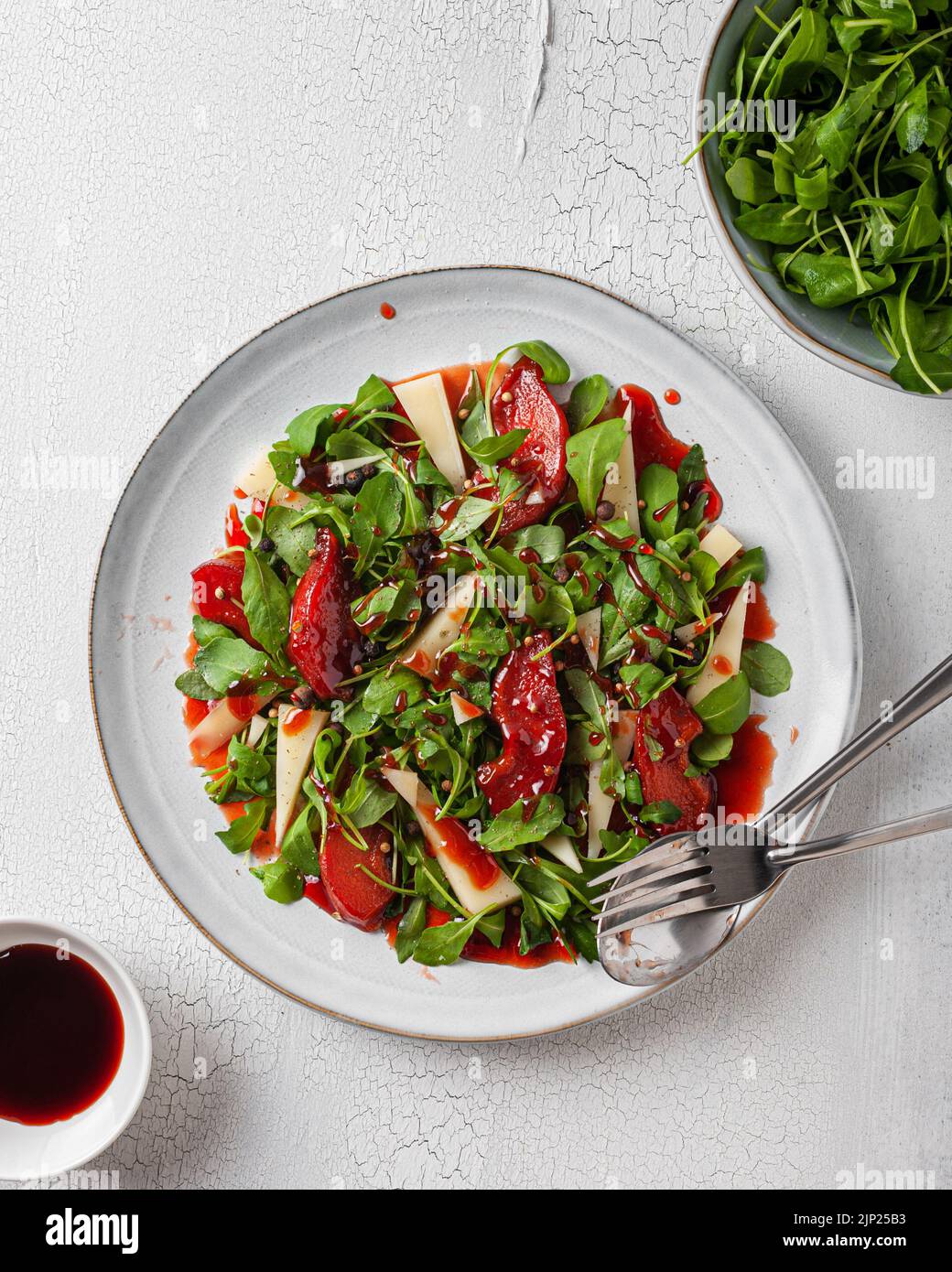salad, dressing, rucola-quitten-salat, low fat, salads Stock Photo - Alamy