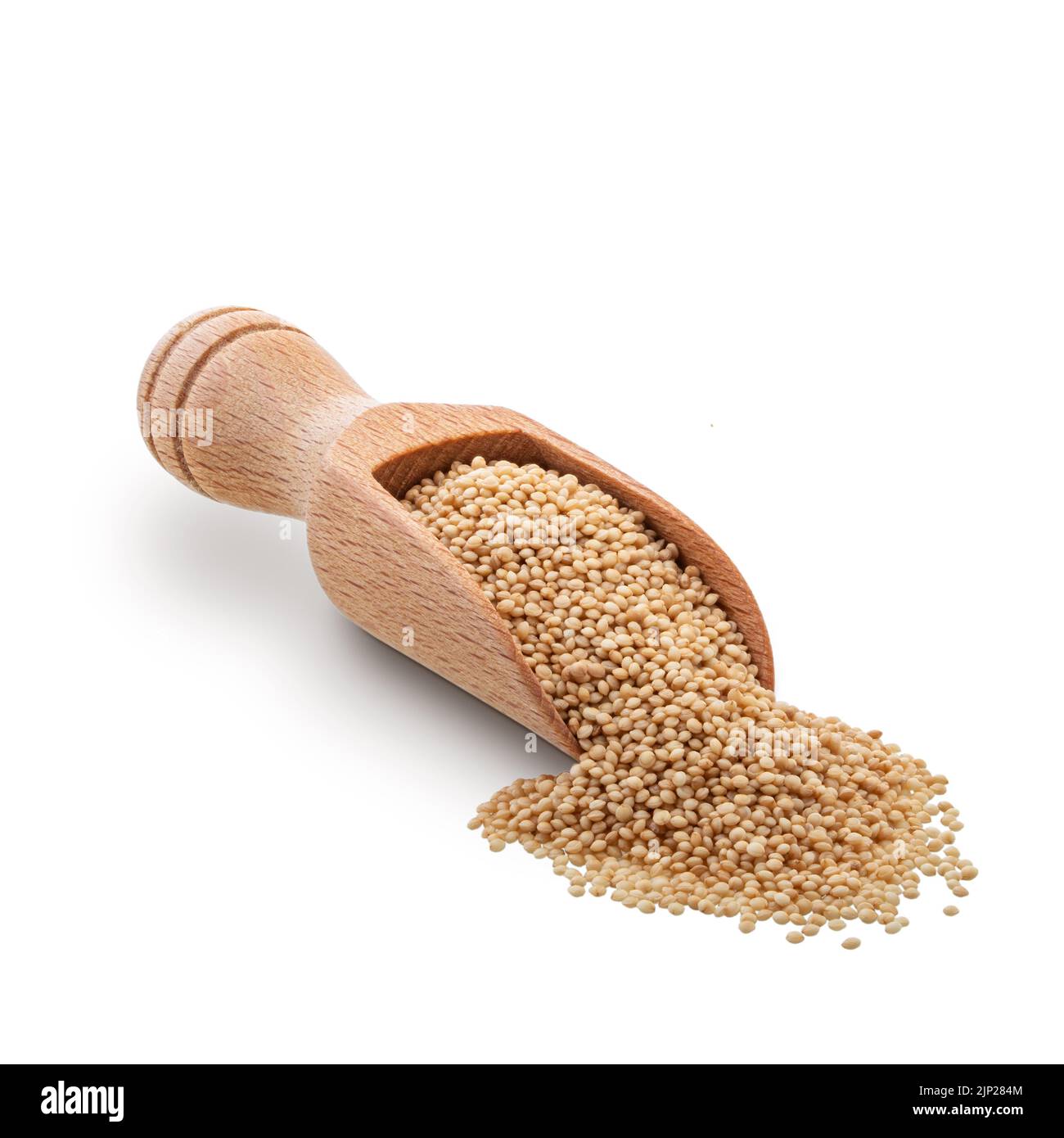Wooden scoop full of amaranth seeds isolated on white background. Deep focus Stock Photo