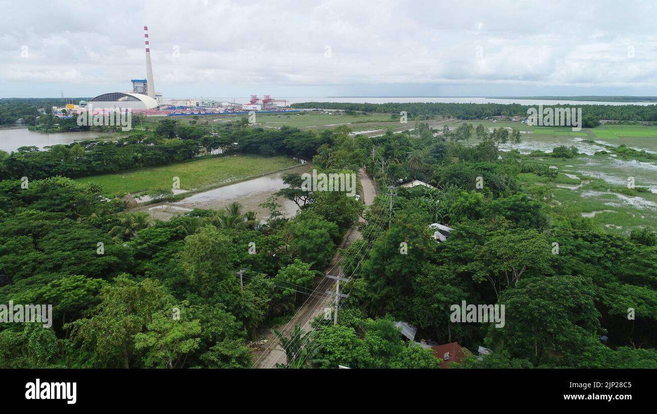 Barguna. 15th Aug, 2022. Photo taken on July 26, 2022 shows a widened and reconstructed bituminous road at a village in Barguna, Bangladesh. TO GO WITH 'Feature: BRI brings 'road to prosperity' for remote river bank residents in southern Bangladesh' Credit: Xinhua/Alamy Live News Stock Photo