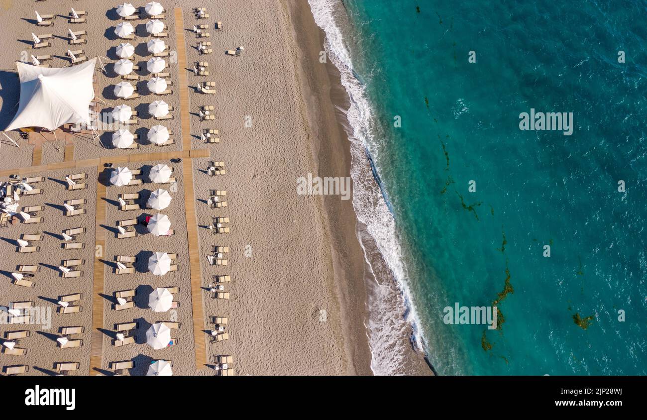 Aerial photo of a beach bar in the shore of Agiokampos beach , Greece Stock Photo