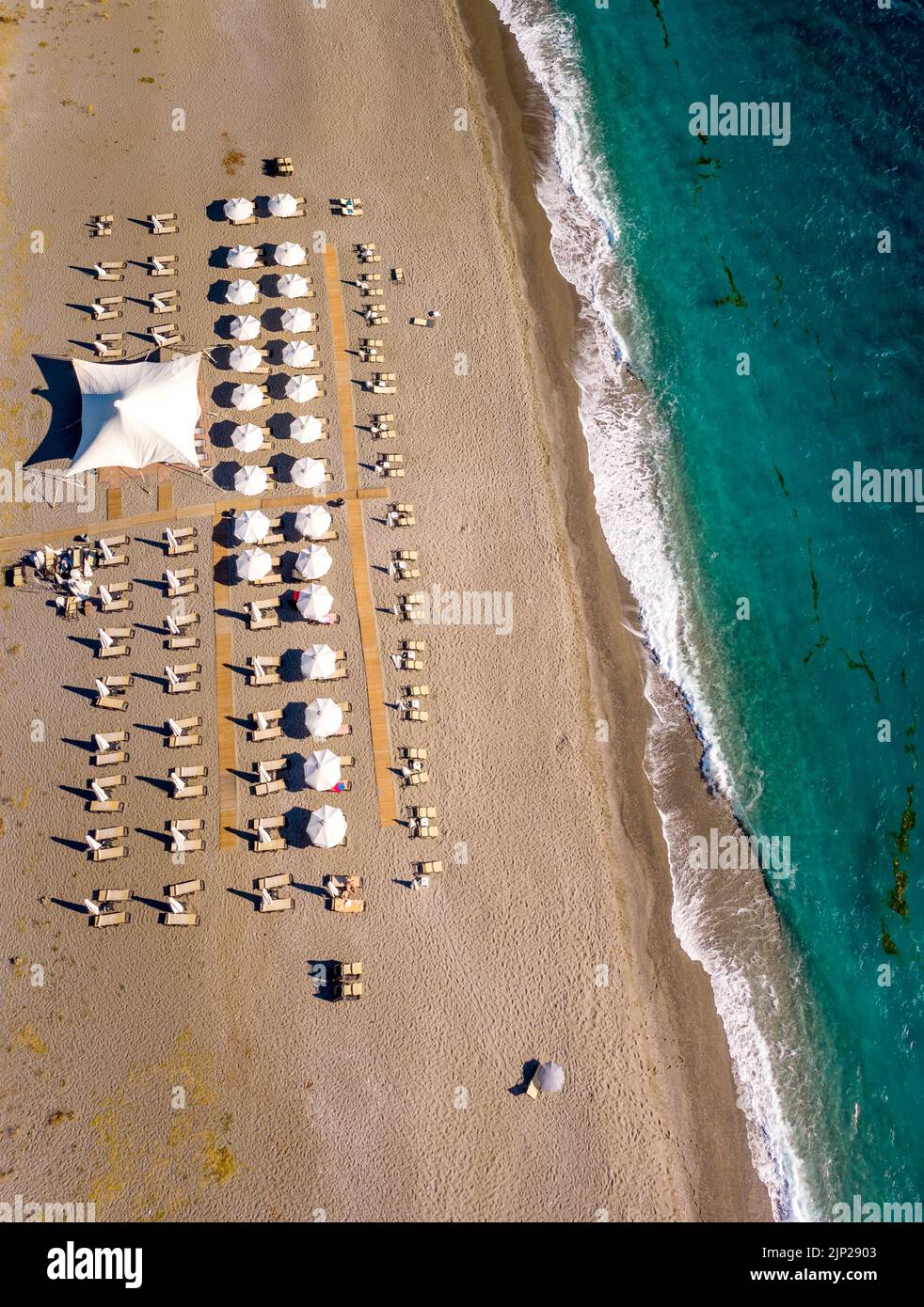 Aerial photo of a beach bar in the shore of Agiokampos beach , Greece Stock Photo
