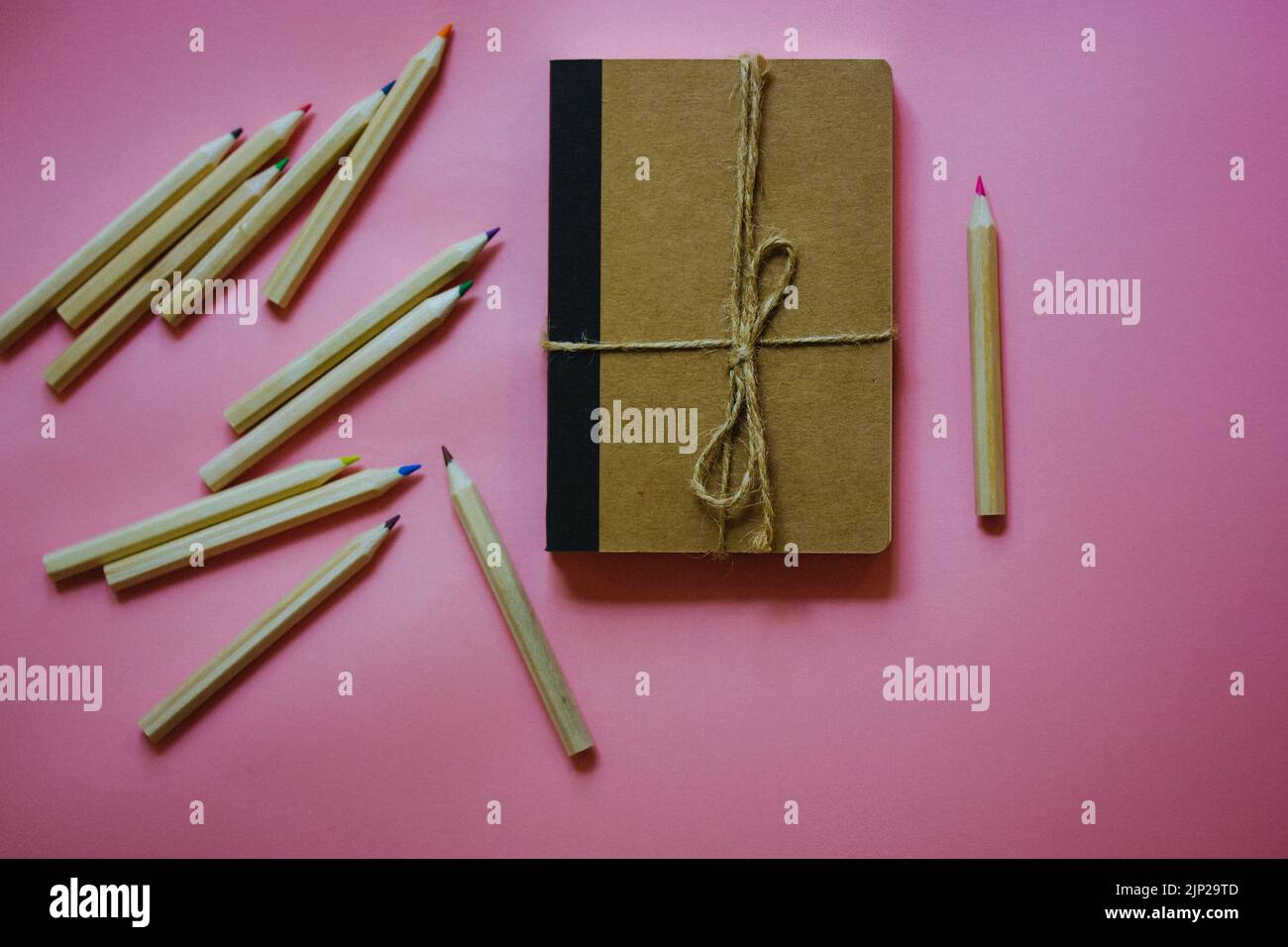 Cardboard notepad for notes tied with sacking rope bow flatly Wooden