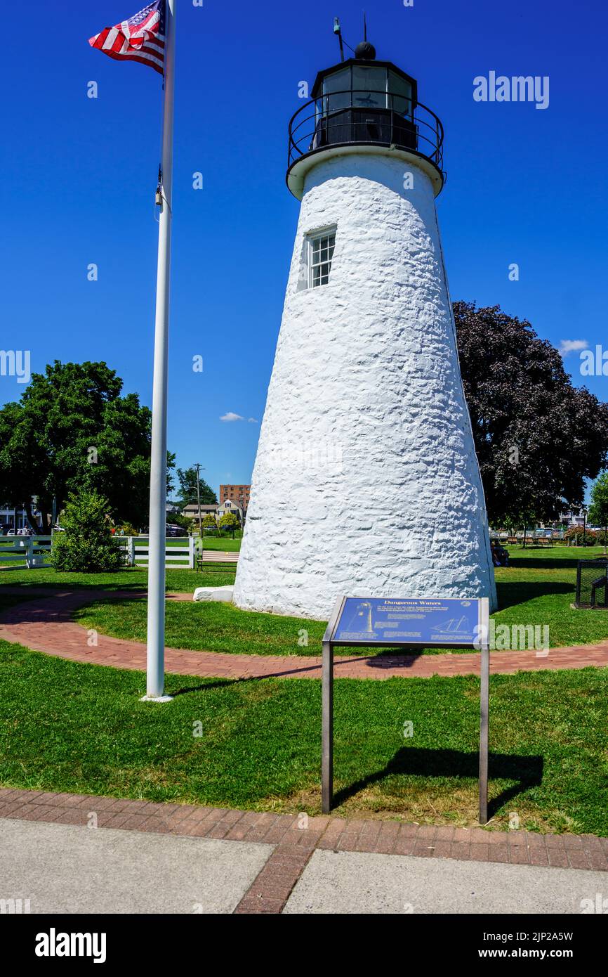 Havre de Grace, MD, USA – August 13, 2022: The Concord Point Lighthouse at the edge of the Chesapeake Bay shore line in the Harford County town. Stock Photo
