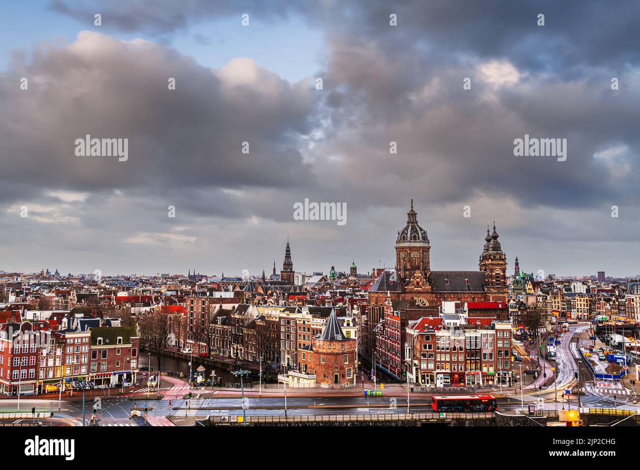 Amsterdam, Netherlands town cityscape over the Old Centre District with Basilica of Saint Nicholas. Stock Photo