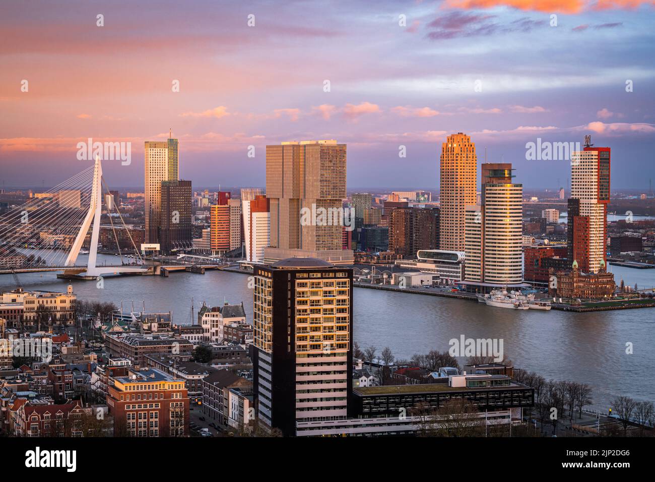 Rotterdam, Netherlands, city skyline over the Nieuwe Maas River at twilight. Stock Photo