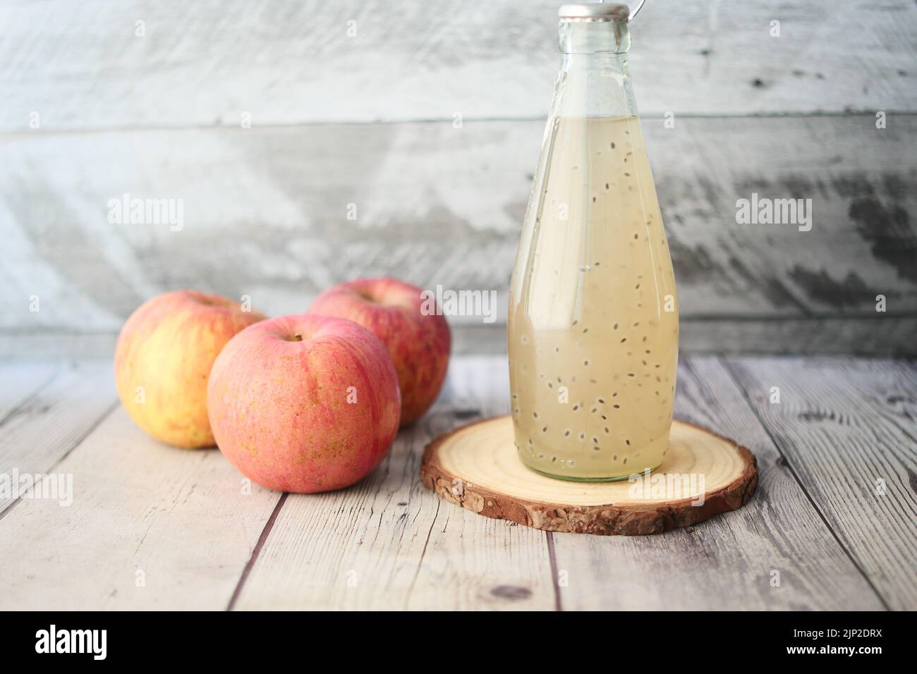 seed apple juice in a bottle on table Stock Photo Alamy
