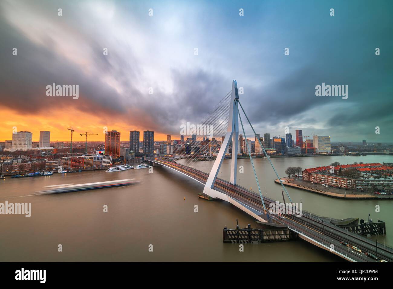 Rotterdam, Netherlands, city skyline over the river at twilight. Stock Photo