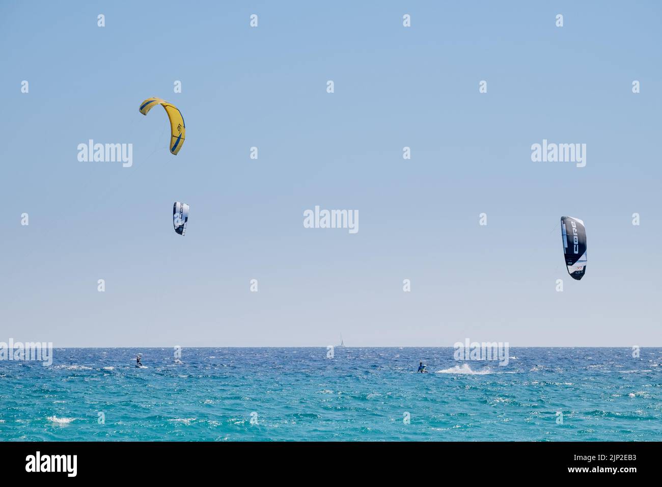 Kitesurfers surfing in the sea of Agiokampos beach, Greece Stock Photo Alamy
