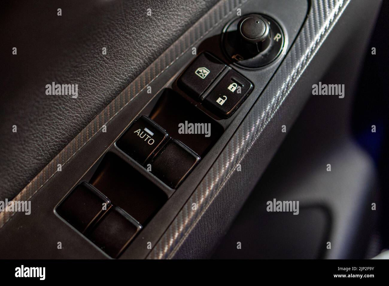A closeup of the car window buttons on the driver's side Stock Photo Alamy