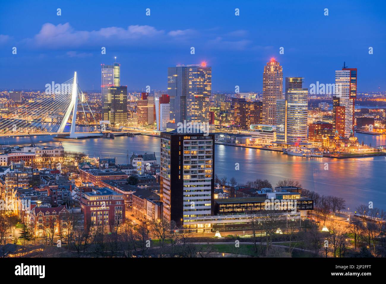 Rotterdam, Netherlands, city skyline over the Nieuwe Maas River at twilight. Stock Photo
