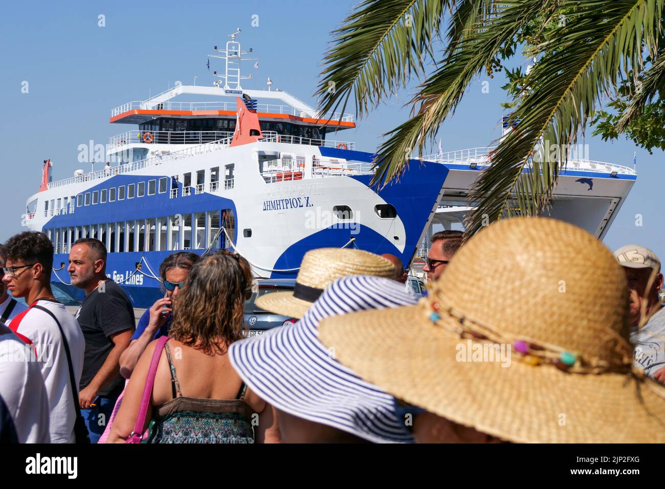 Travellers, Ferry-boat harbor, Thassos, Macedonia, North-Eastern France Stock Photo