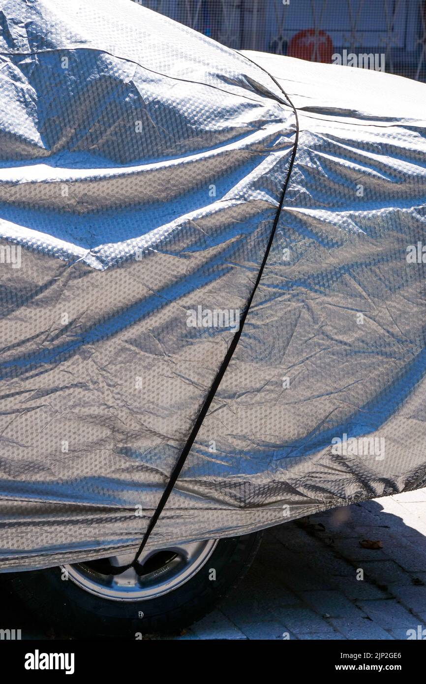 A car protected from sun by a tarpaulin, Thassos, Macedonia, North-Eastern France Stock Photo
