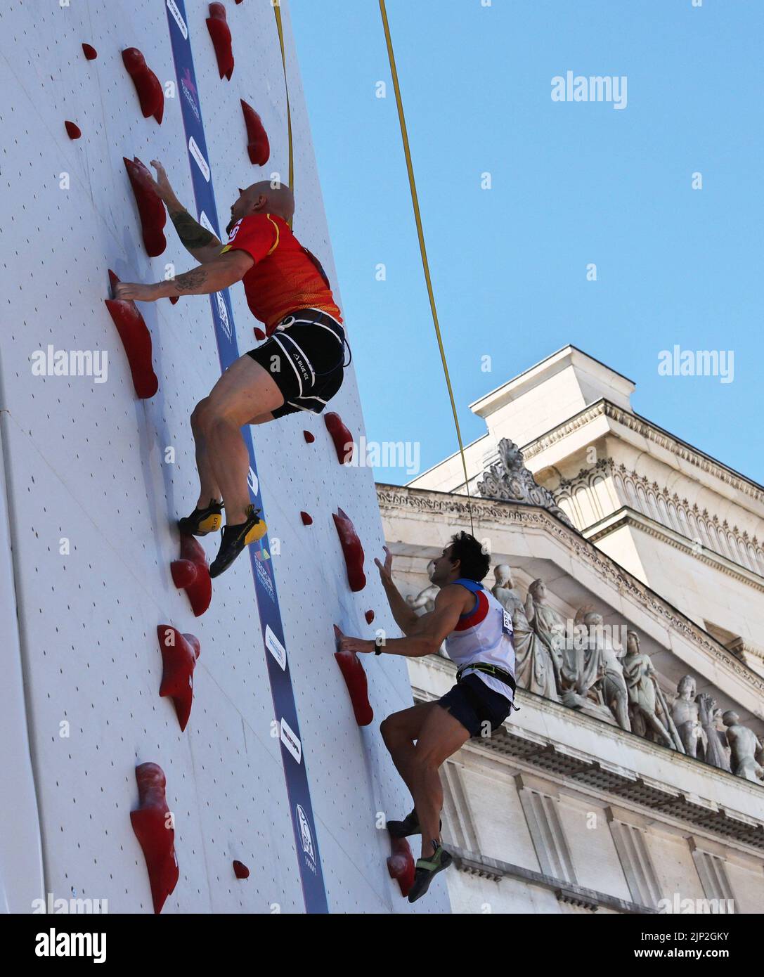 2022 European Championships - Sport Climbing - Konigsplatz, Munich, Germany - August 15, 2022 Spain's Erik Paulo Noya Cardon and Italy's Alessandro Boulos in action during the men's speed final REUTERS/Wolfgang Rattay Stock Photo
