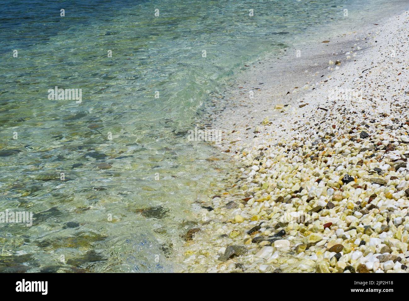 Marble pebble beach, Thassos, Macedonia, North-Eastern France Stock Photo