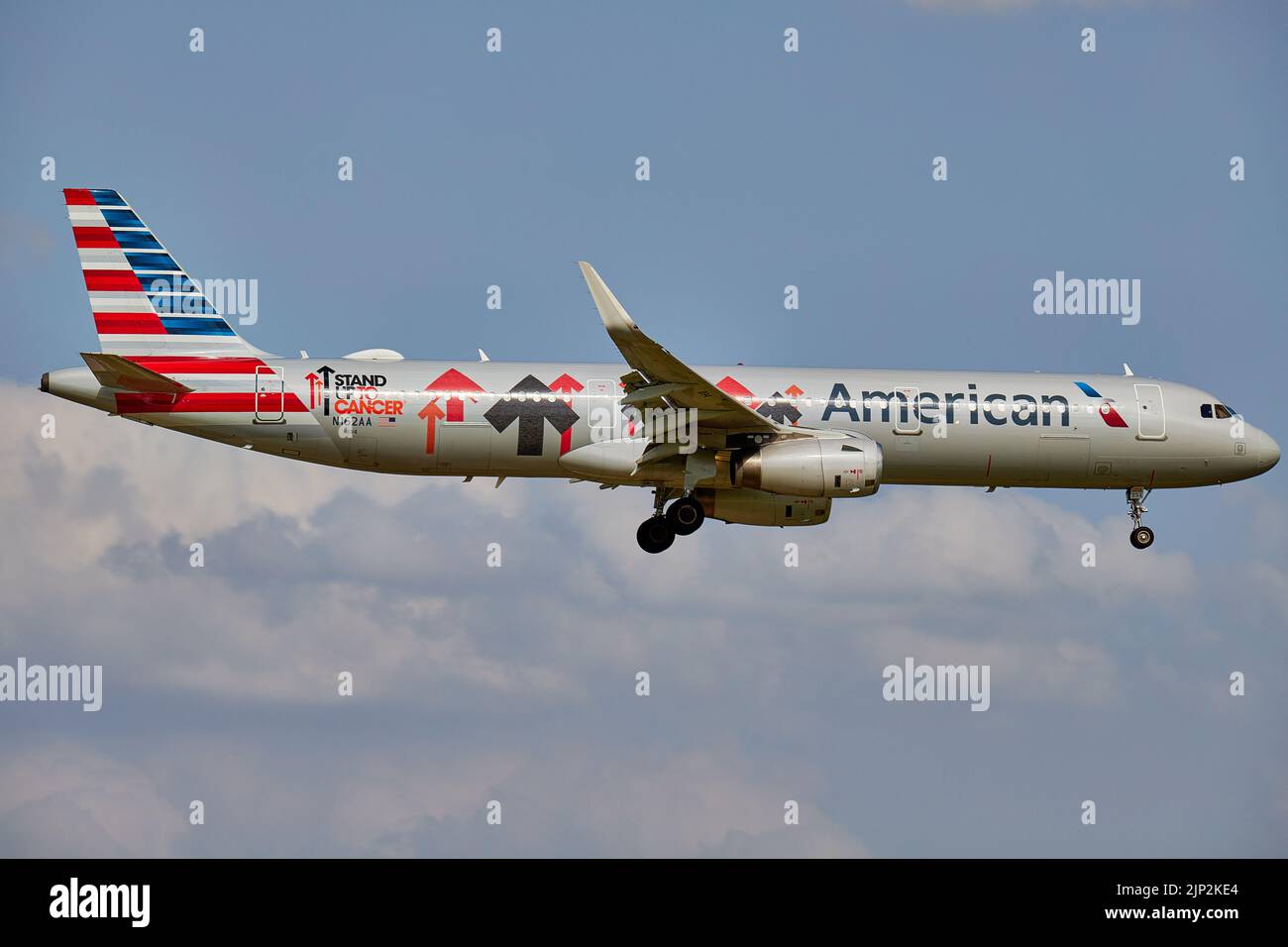 The American Airlines' Stand Up To Cancer Plane flying in a cloudy sky