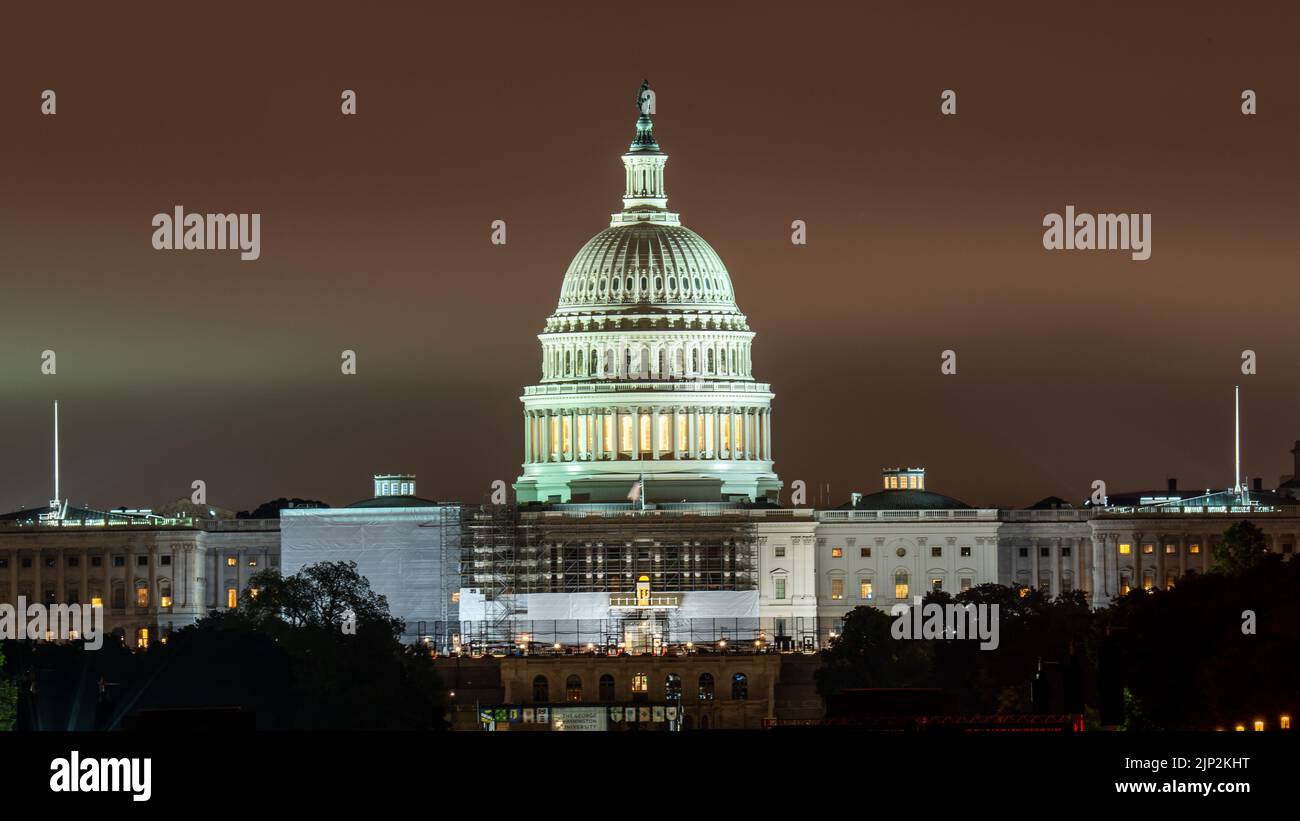 A stunning view of the US Capitol building at night, Washington DC ...