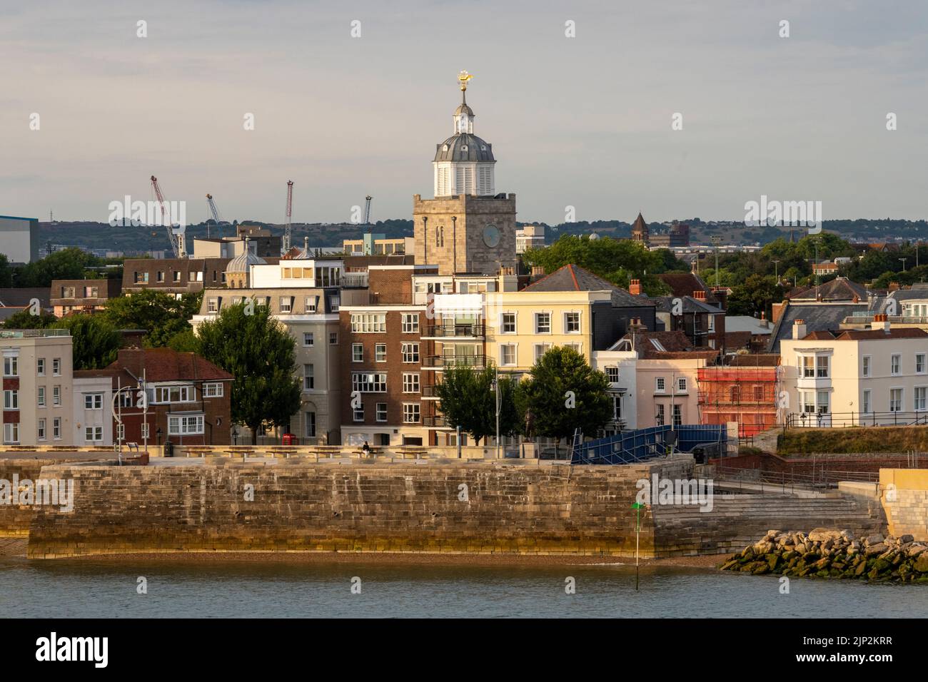 The tower of Portsmouth Cathedral in the middle of Old Portsmouth, Hampshire, UK. The wooden cupola was added in 1703, while the weather vane, known as the Golden Barque, was added in 1710. It has recently been replaced by a replica, but the original is on display in the cathedral Stock Photo
