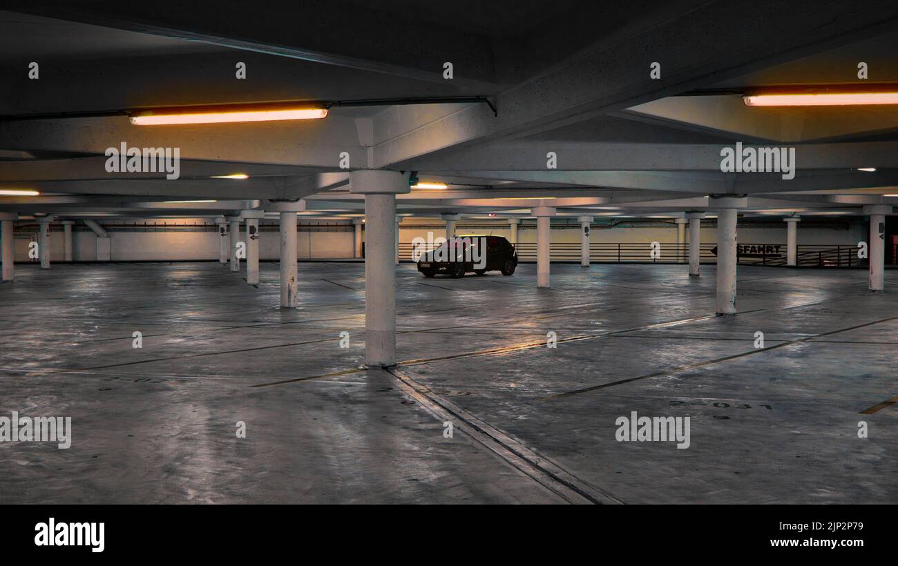 An Empty Parking Garage At A Night Time Background, Parking Garage Near Me  To Take Picture, Car, Garage Background Image And Wallpaper for Free  Download