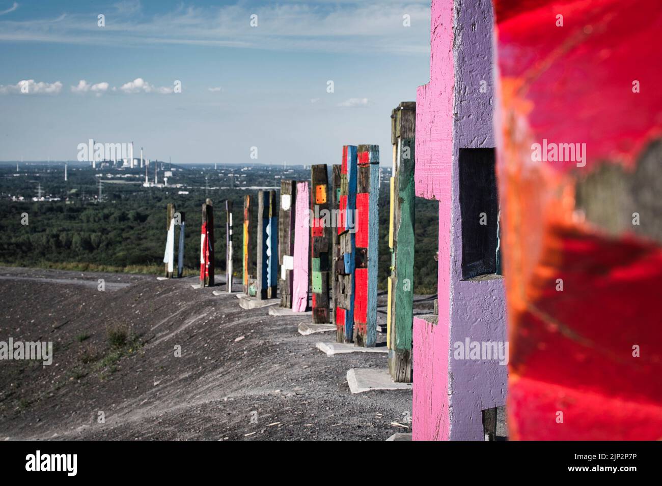 An art installation made of colored piles on the Haniel slagheap in the Ruhr area in Germany Stock Photo
