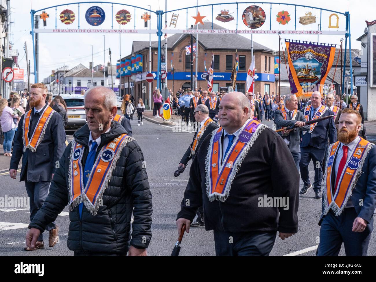 Ballymena, UK, 25th Jun 2022. Orange Order members going through the