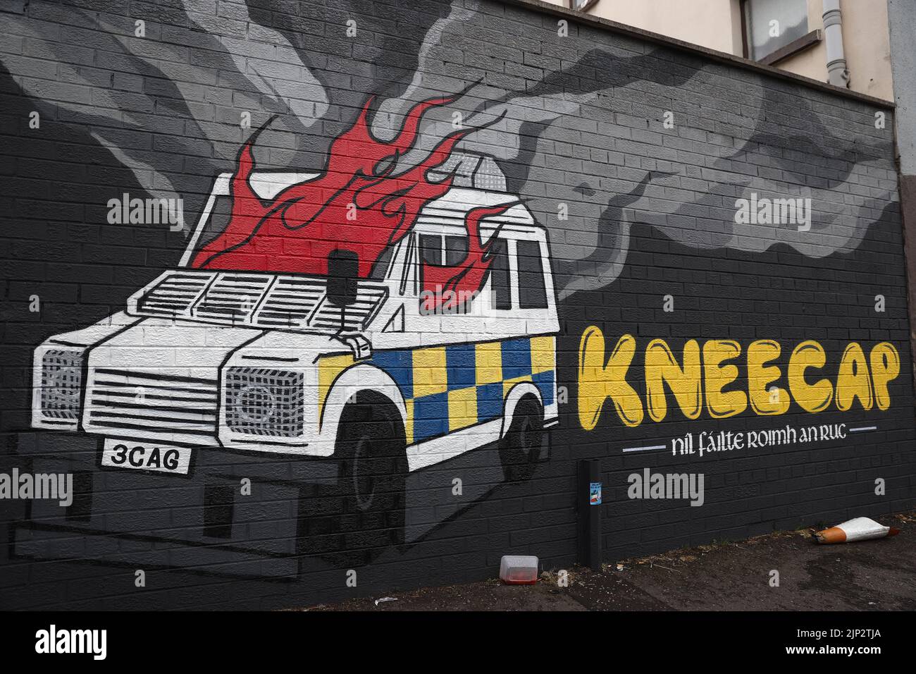 Irish language rap group Kneecap's mural of a burning police Land Rover on Hawthorn Street in Belfast. There have been calls for political leadership after a series of incidents across the weekend, including pro-IRA chants at a concert in west Belfast. The Wolfe Tones played their annual gig to close Feile an Phobail in west Belfast on Sunday evening. Picture date: Monday August 15, 2022. Stock Photo