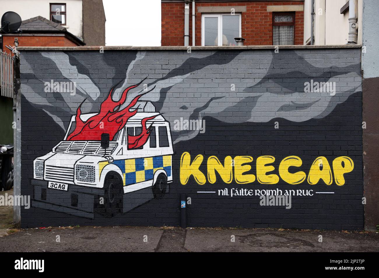 Irish language rap group Kneecap's mural of a burning police Land Rover on Hawthorn Street in Belfast. There have been calls for political leadership after a series of incidents across the weekend, including pro-IRA chants at a concert in west Belfast. The Wolfe Tones played their annual gig to close Feile an Phobail in west Belfast on Sunday evening. Picture date: Monday August 15, 2022. Stock Photo
