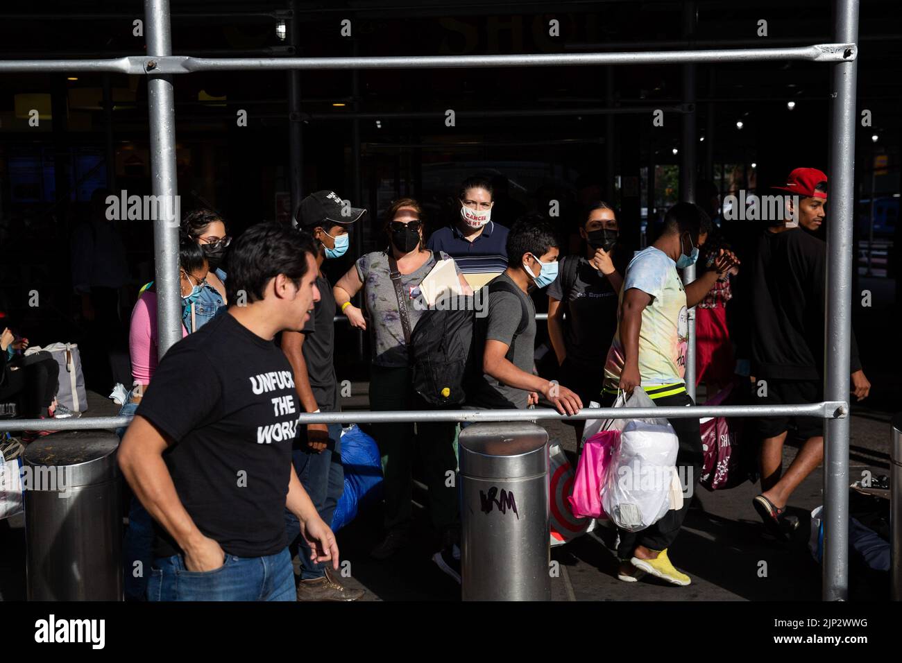 A bus with 52 asylum seekers from Texas arrived at Port Authority in ...