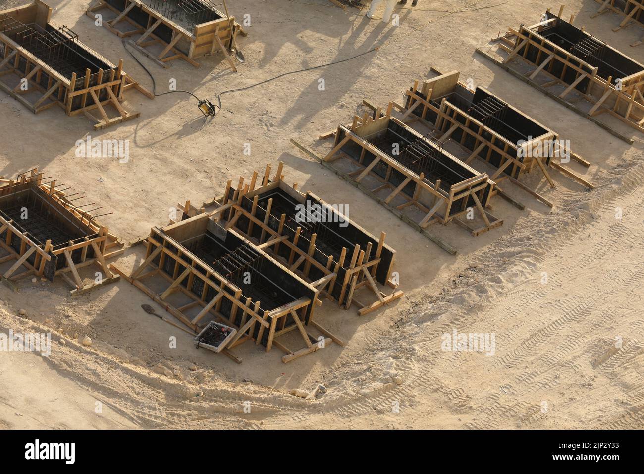 Timber formwork with metal reinforcement for pouring concrete and creating a solid foundation