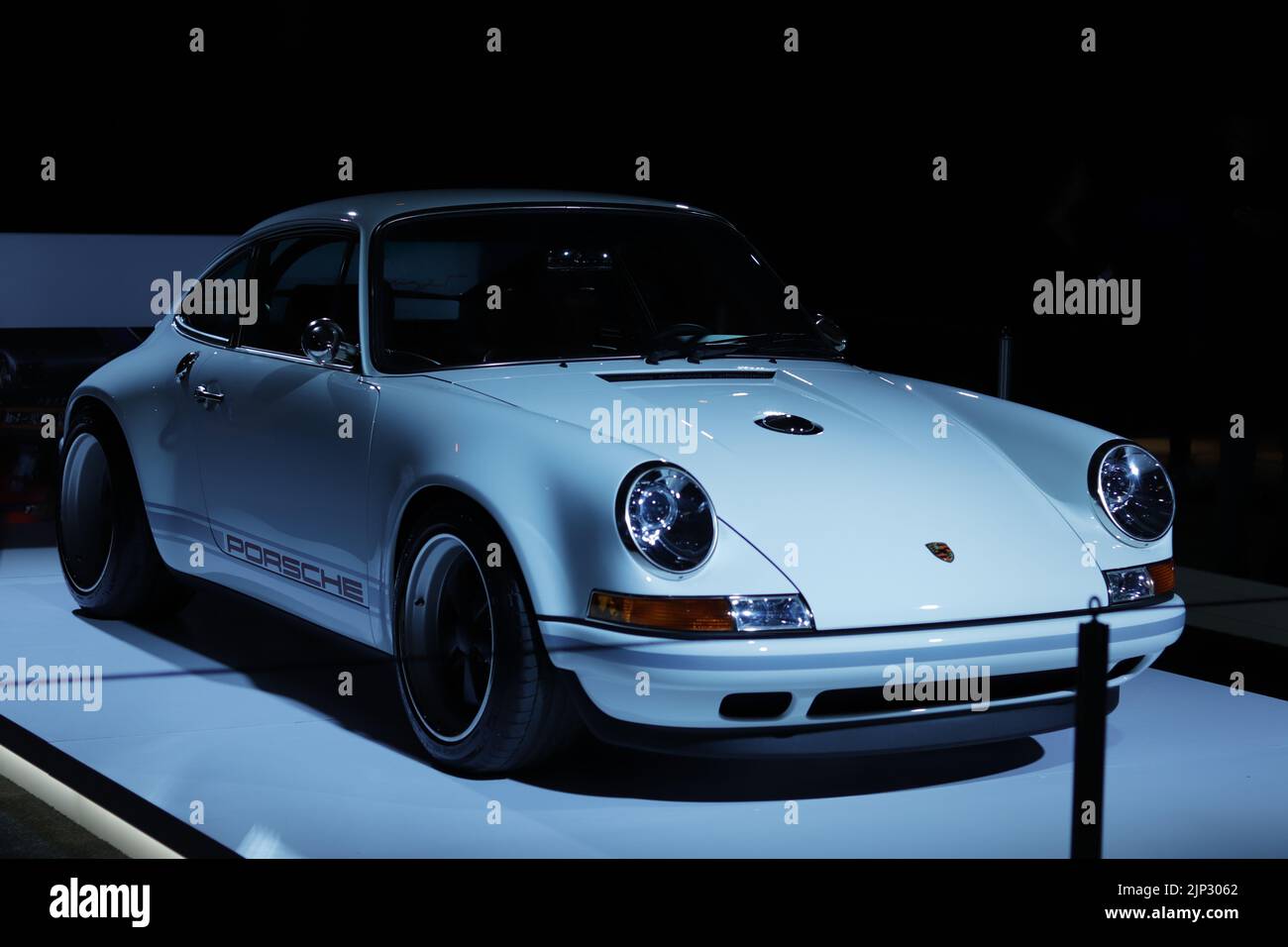 A white classic Porsche sports car on display at the Toronto auto show Stock Photo