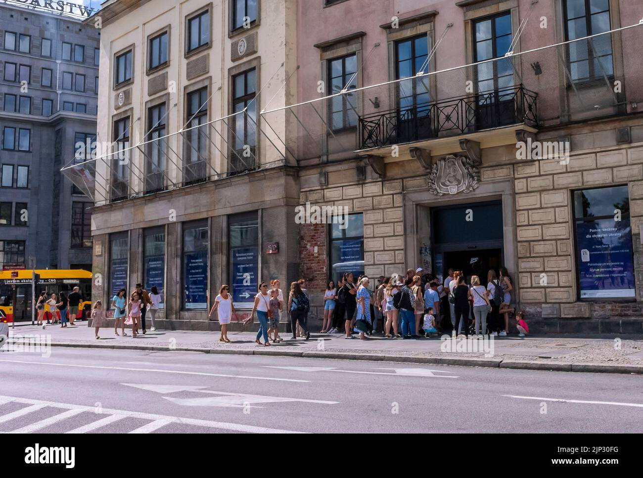 Warsaw, Poland, Street Scene, Crowd People, Ukrainian Refugees Waiting Outside Polish Government Office for Processing Applications, Old Town Center, War Migration, immigration queue Stock Photo