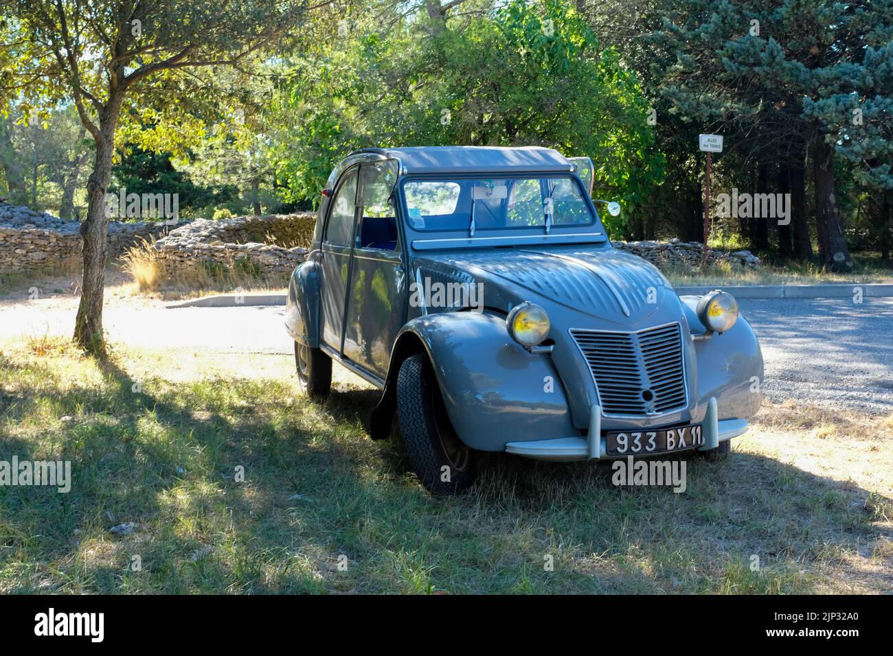 An early Citroen 2CV parked in rural France. 2022. Stock Photo
